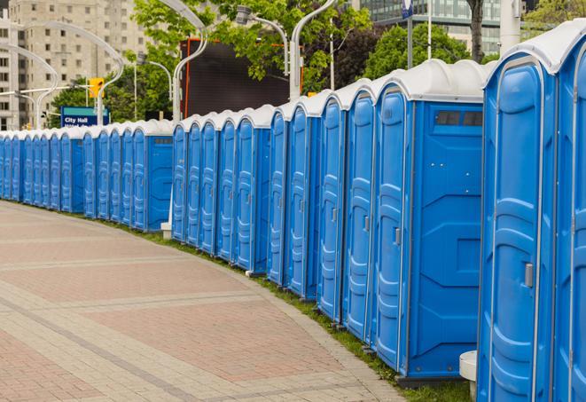 a row of portable restrooms for a special event, ensuring guests have access to clean facilities in Elverta